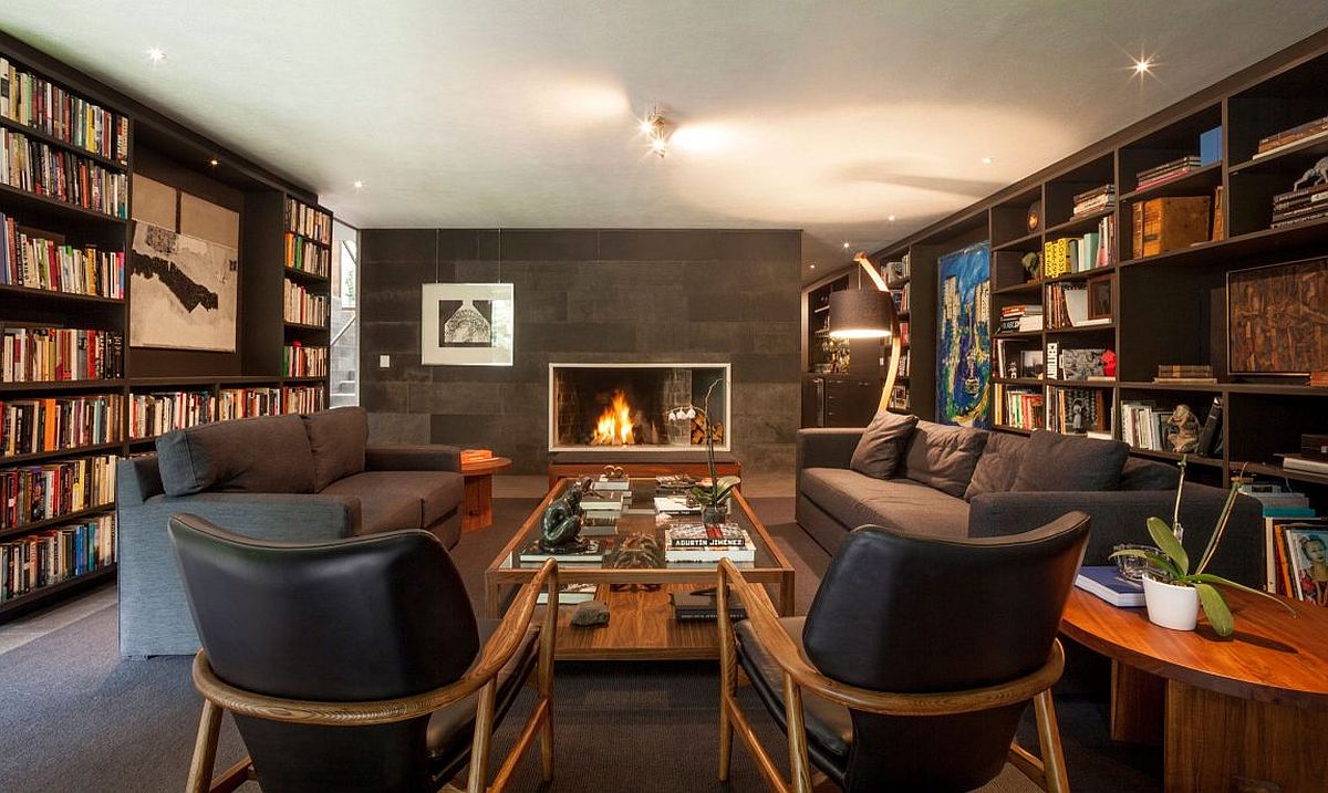 Contemporary-living-room-and-sitting-space-with-walls-of-books-all-around.jpg