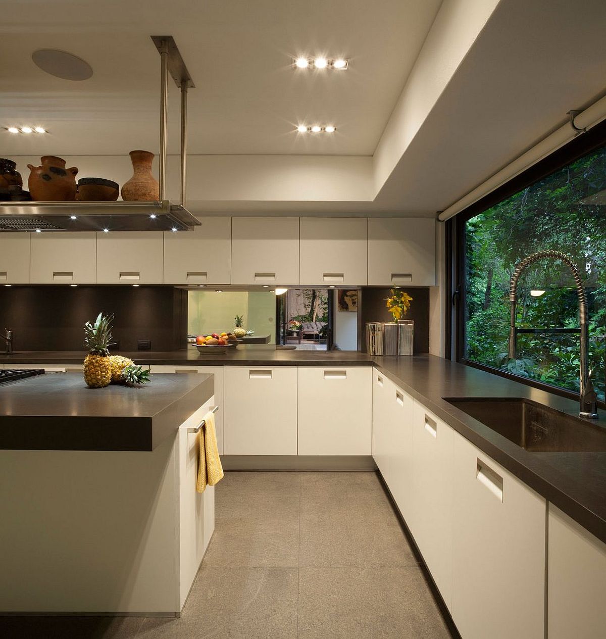 Spacious-contemporary-kitchen-makes-smart-use-of-corner-space.jpg